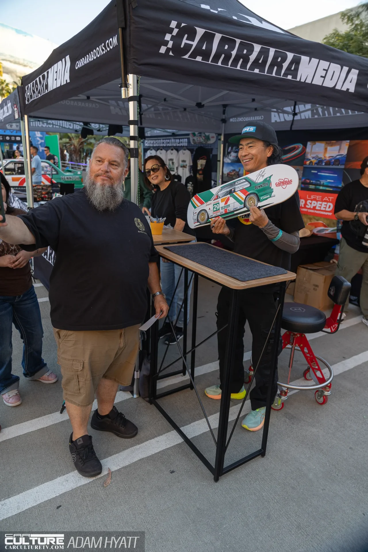 TypeS Auto Night Lights Larry Chen signing skateboard