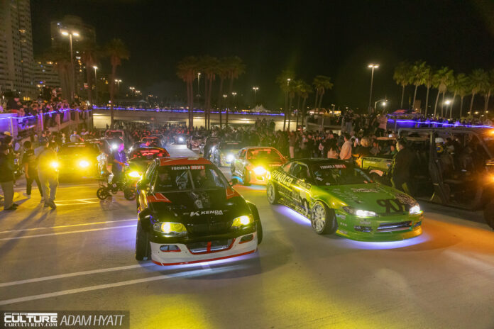 Formula D cars arriving to TypeS Auto Night Lights