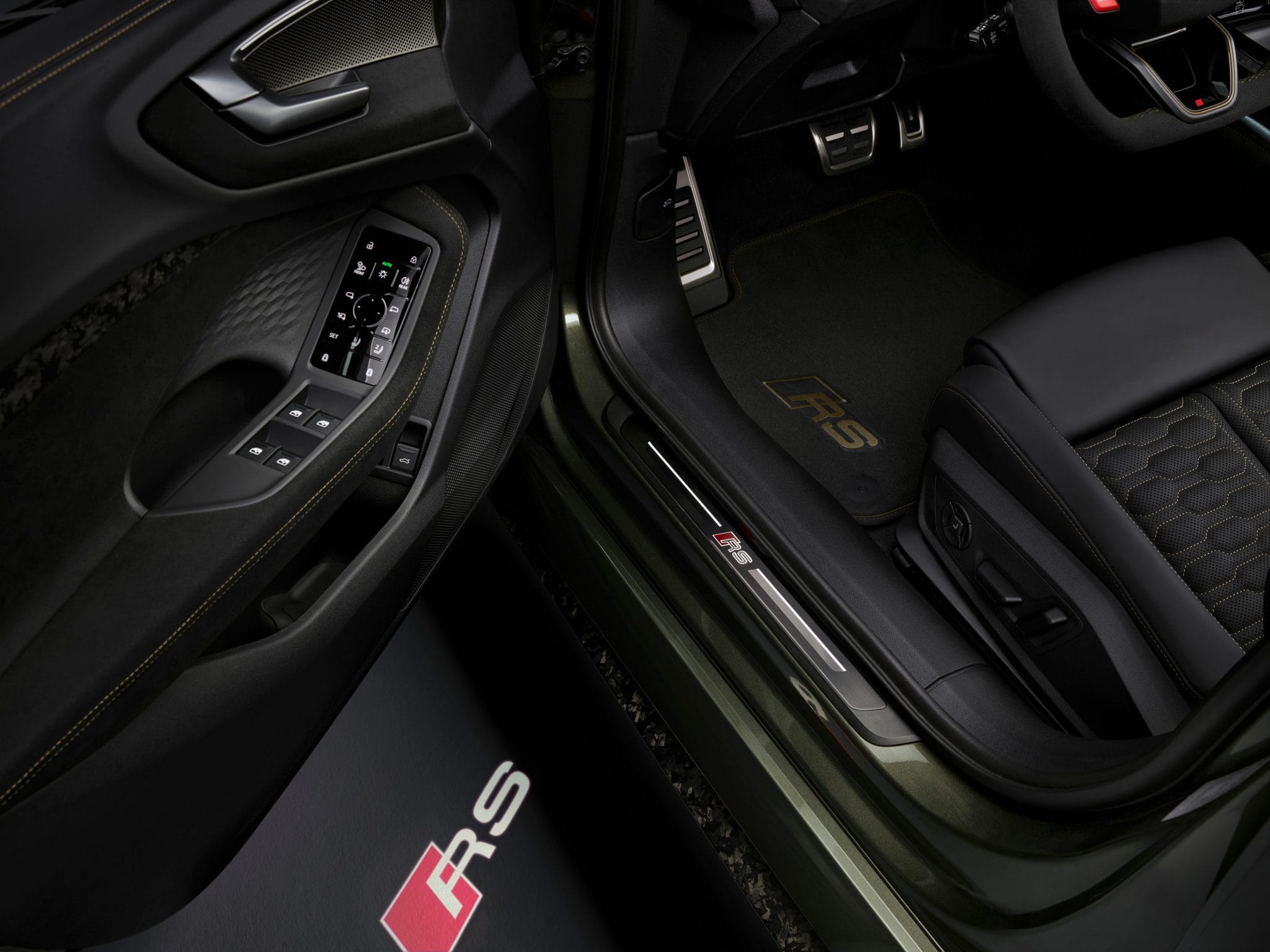 Audi RS5 door sill with illuminated RS logo and performance interior trim