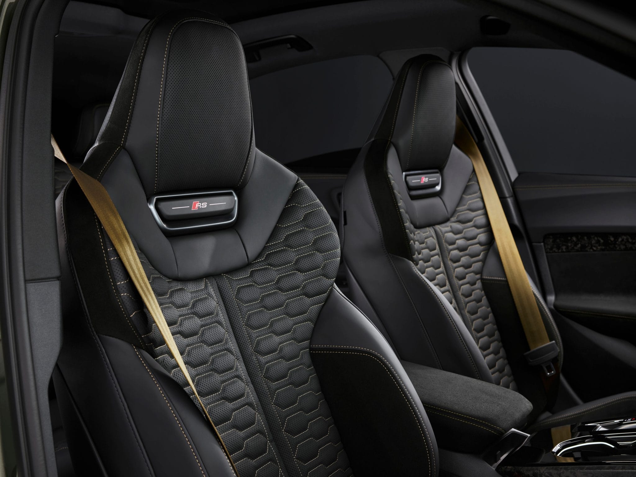 Audi RS5 sport seats with black leather and gold contrast stitching