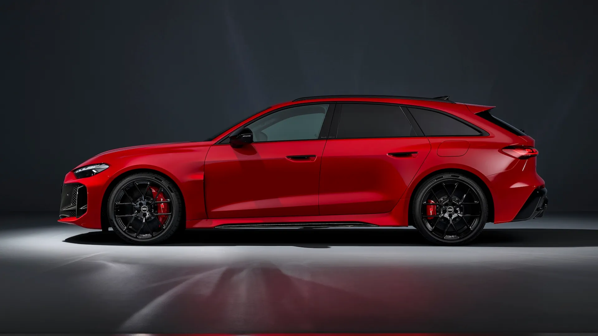 2027 Audi RS5 Avant side profile studio image with red brake calipers