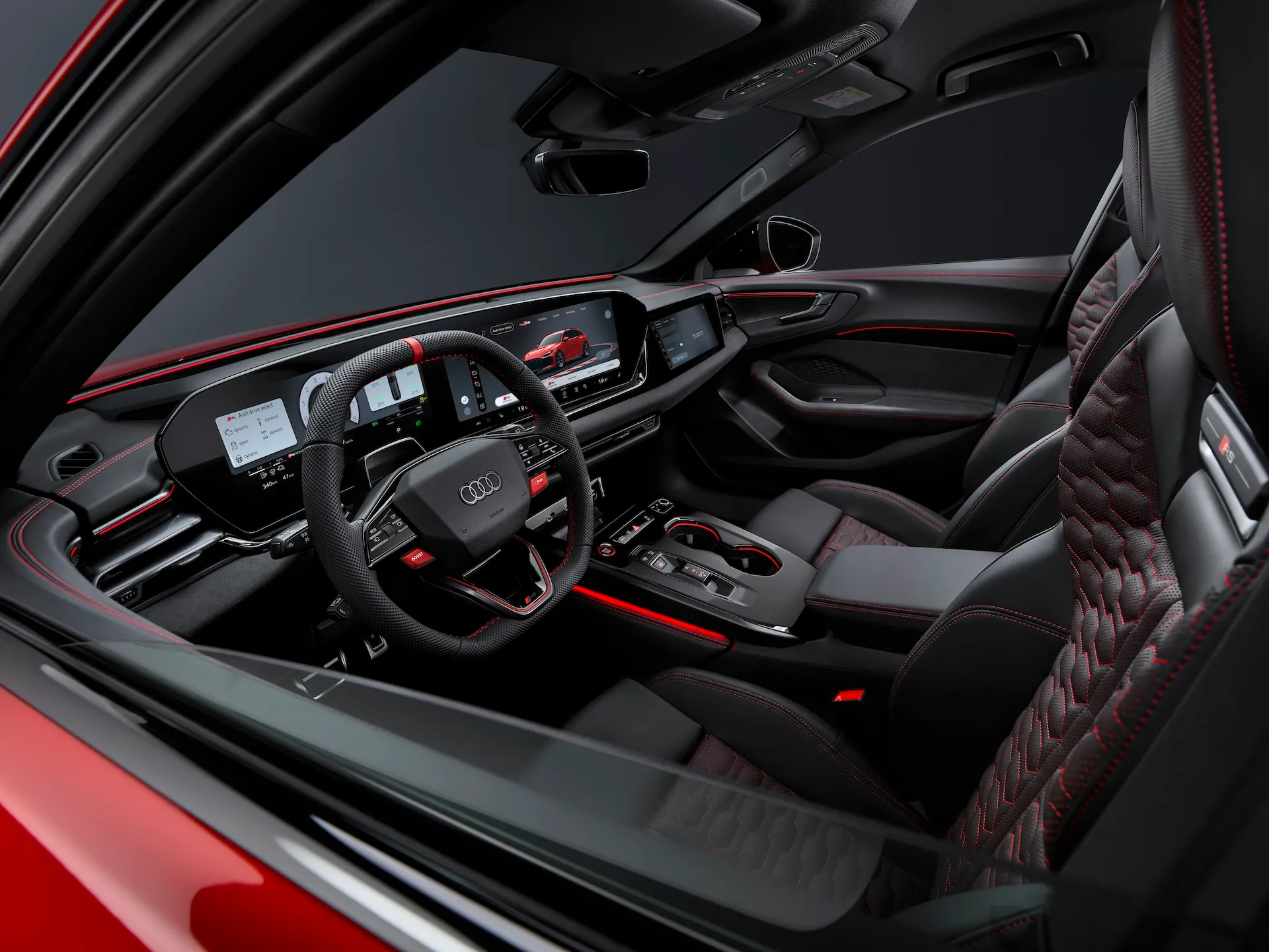 2027 Audi RS5 Avant interior with digital cockpit and red ambient lighting