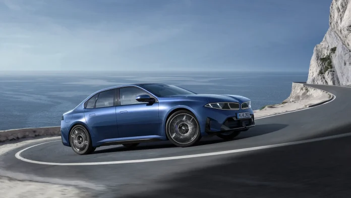 2027 BMW I3 on a mountain road 3 quarter view