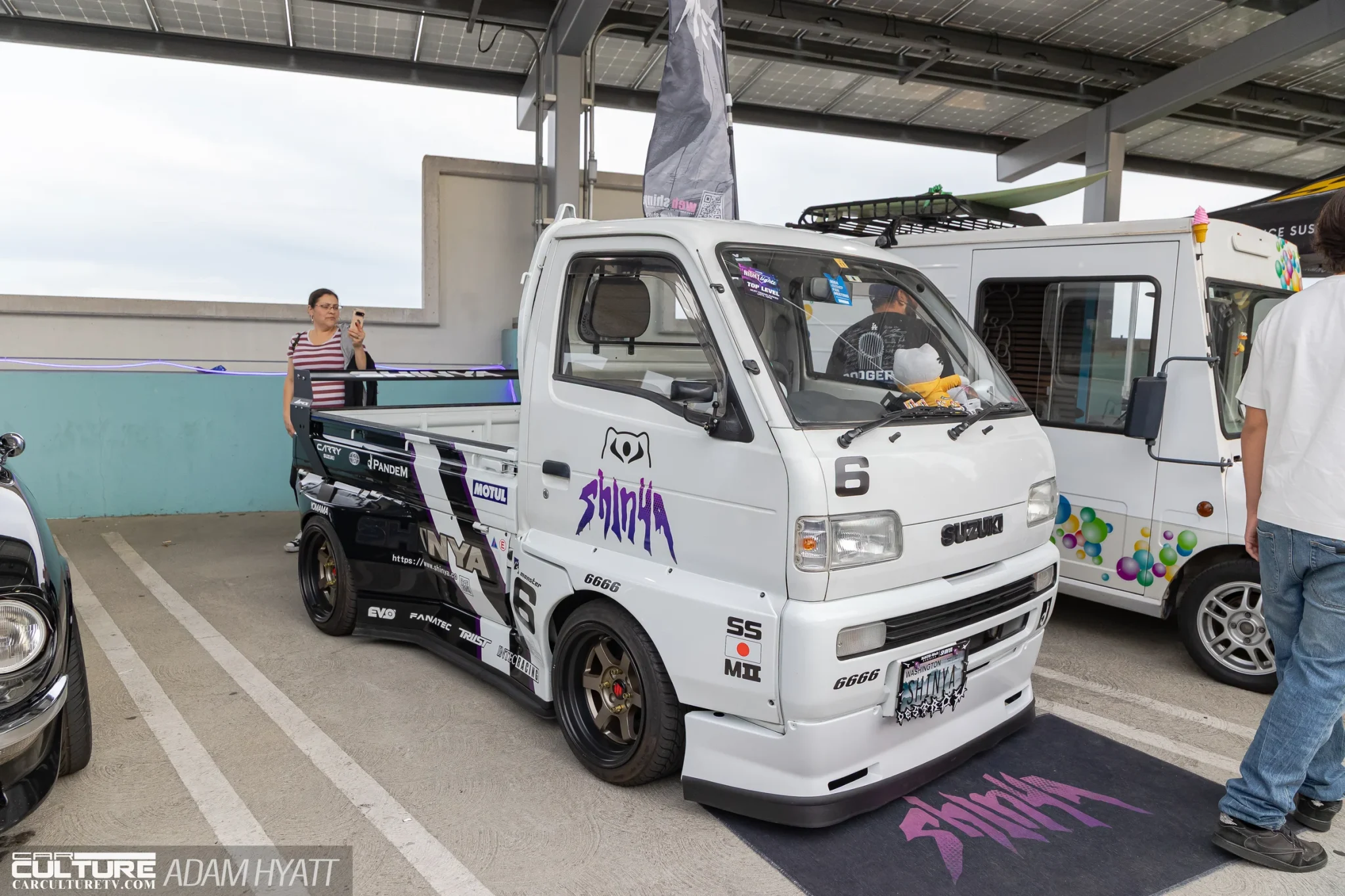 Suzuki Carry with Pandem/Rocket Bunny stickers and Shinya livery running TE37-style wheels